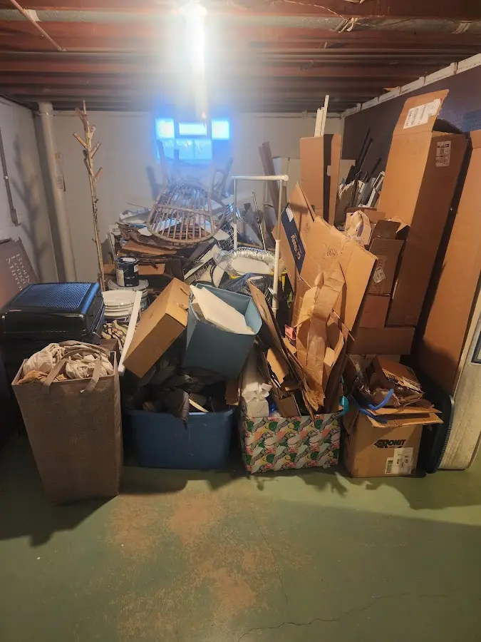 Roll-off dumpster container at job site for 15 Yard Dumpster Rental in Burlington